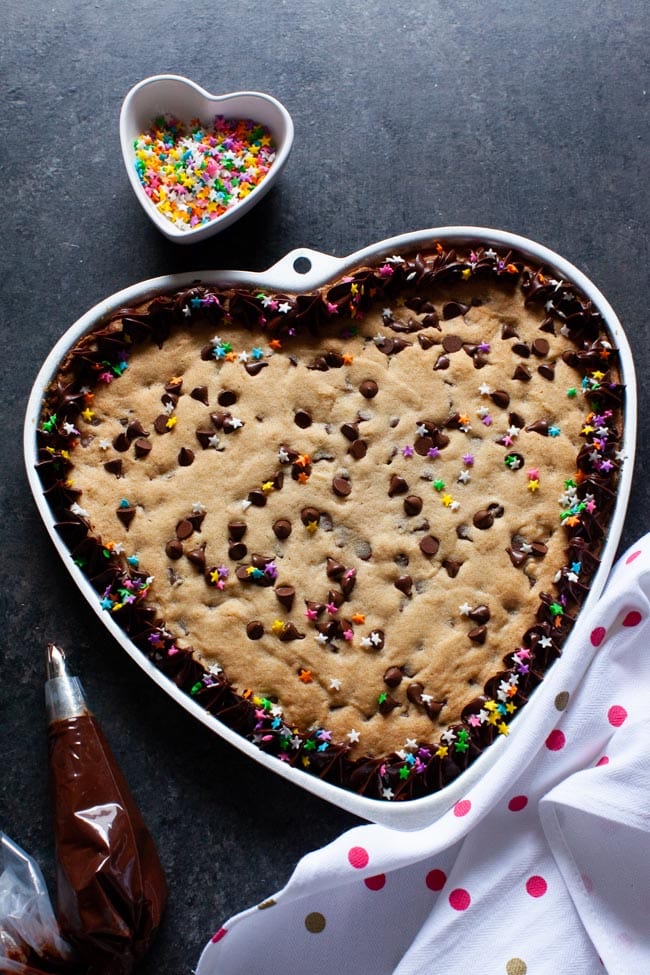 Heart-Shaped Chocolate Chip Cookie Cake - The Little Kitchen